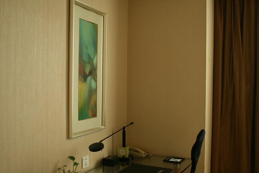 Merryland Traders Hotel Changshu Quarto foto