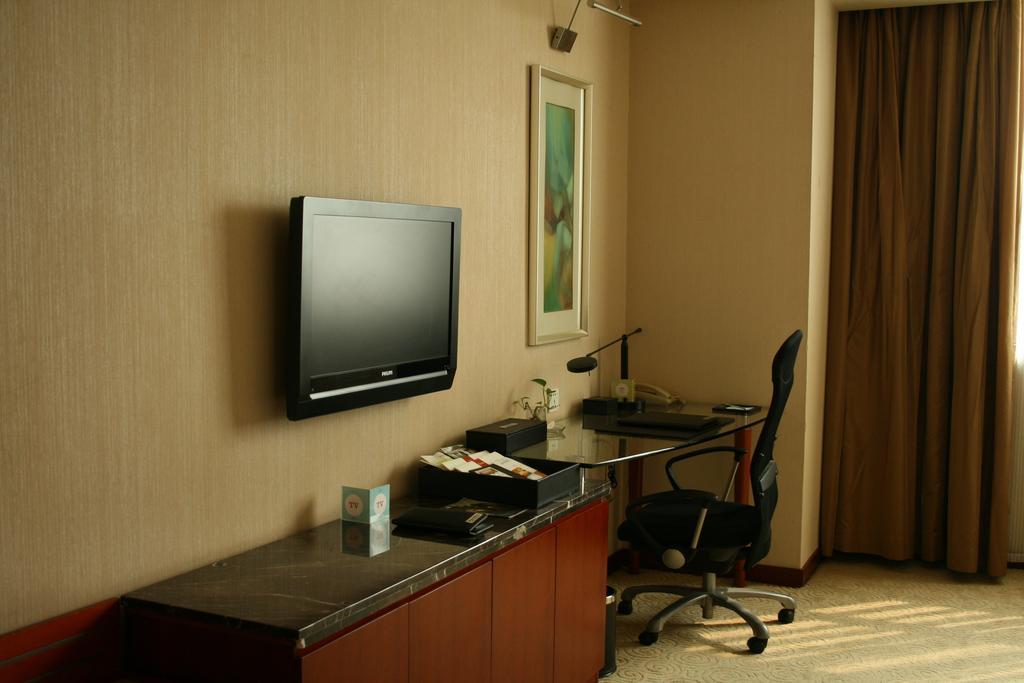 Merryland Traders Hotel Changshu Quarto foto